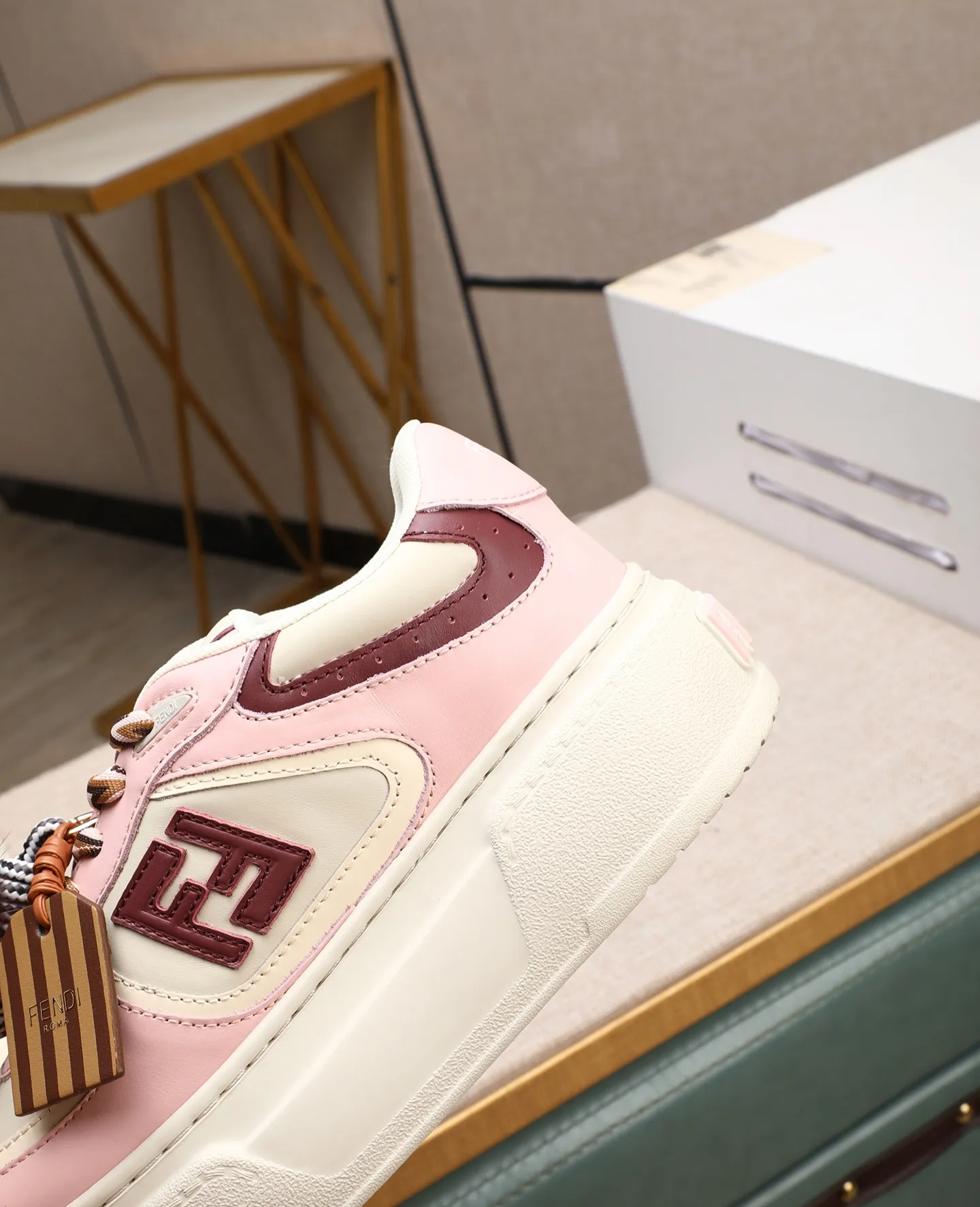 Men's shoes 💰740 Top quality Fendi Match series 25 latest colors Pendant thick sole lace casual FENDI Match lace. Made of light pink leather with white and ocher brown details. Contrast leather FF appliqué on the sides and hiking laces in white, pink and ocher brown. Thick rubber sole with oversized embossed FENDI lettering on the heel. Metal ring charm on the tongue: A small braided doll with contrasting mink fur details and gold metallic FF on the right shoe. The left shoe features a braided cord with contrasting mink double pom poms, metallic FF beads, and Pequin print pattern and logo. Upper: Original custom-made imported first-layer cowhide. Inner lining: Imported custom-made breathable mesh lining. Sole: Original open-molded ultra-light foam material. Bottom thickness: 5CM. Number of yards: women's 35-40 (custom-made 40 non-refundable).